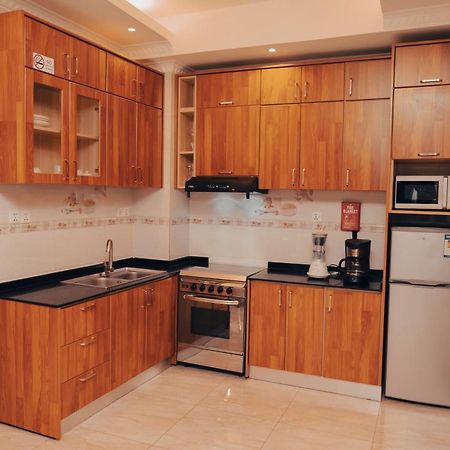 Madras Hotel And Apartments Кигали Экстерьер фото